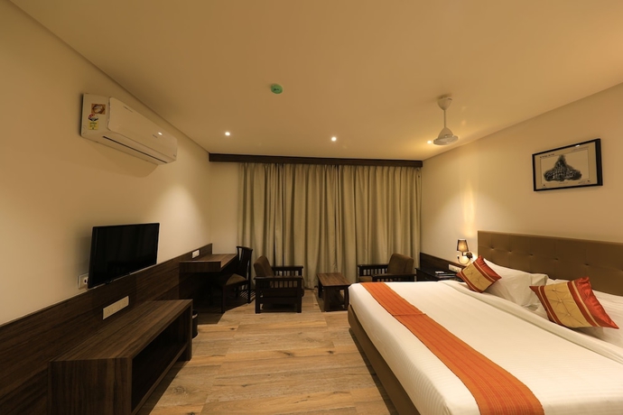 Imagen de la habitación del Hotel The Byke Suraj Club. Foto 12