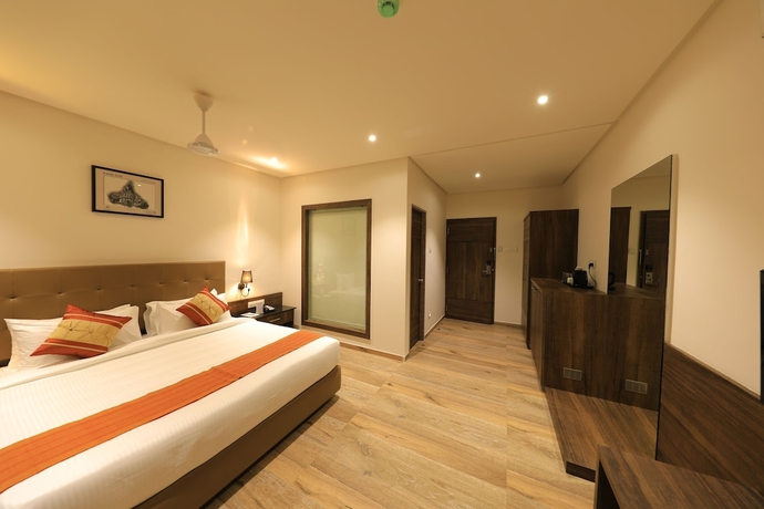 Imagen de la habitación del Hotel The Byke Suraj Club. Foto 14