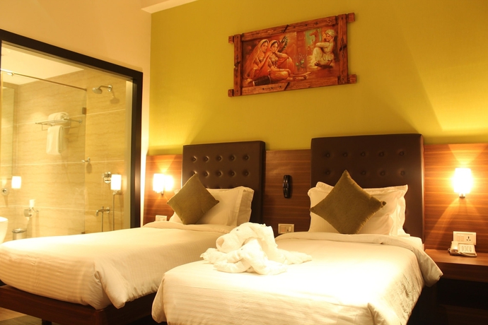 Imagen de la habitación del Hotel The Byke Suraj Plaza. Foto 6