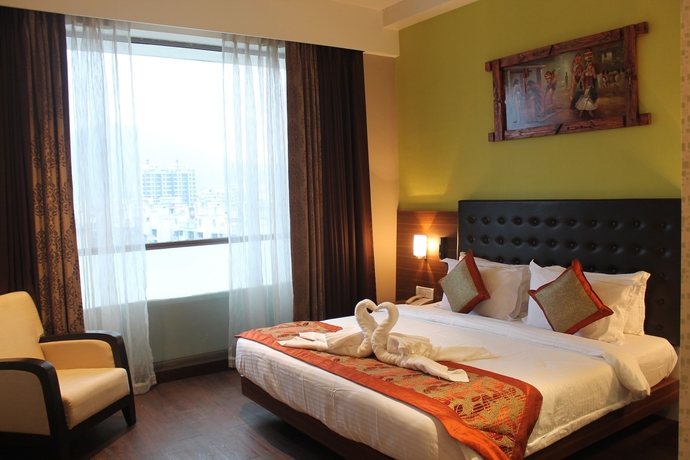Imagen de la habitación del Hotel The Byke Suraj Plaza. Foto 12