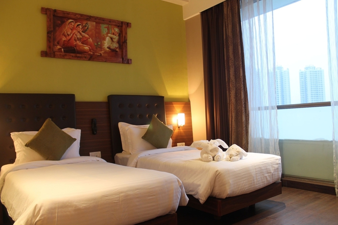Imagen de la habitación del Hotel The Byke Suraj Plaza. Foto 13