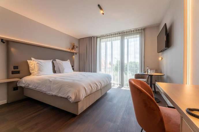 Imagen de la habitación del Hotel The CORNR. Foto 5