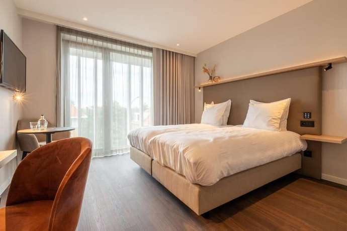 Imagen de la habitación del Hotel The CORNR. Foto 8