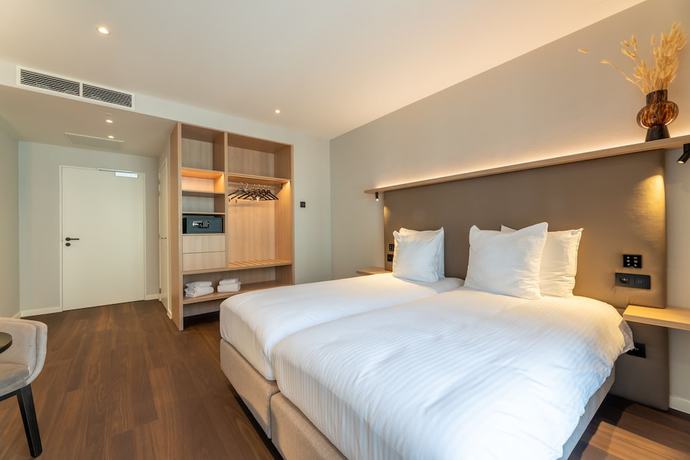 Imagen de la habitación del Hotel The CORNR. Foto 9