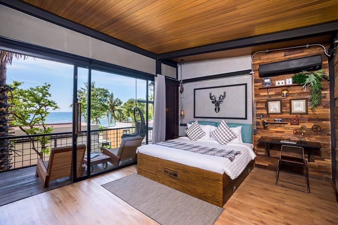 Imagen de la habitación del Hotel The Cabin Beach Resort. Foto 6
