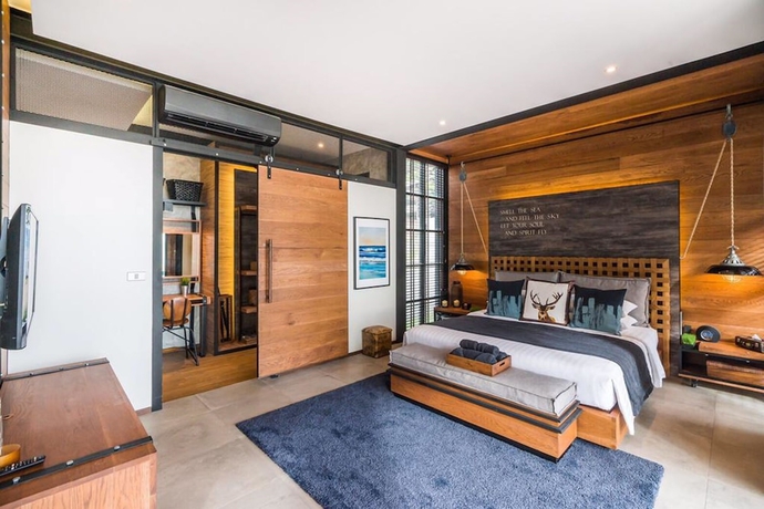 Imagen de la habitación del Hotel The Cabin Beach Resort. Foto 11