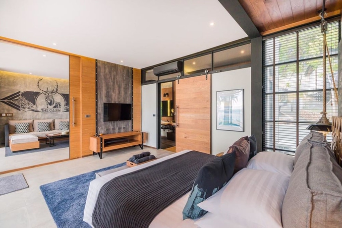 Imagen de la habitación del Hotel The Cabin Beach Resort. Foto 12