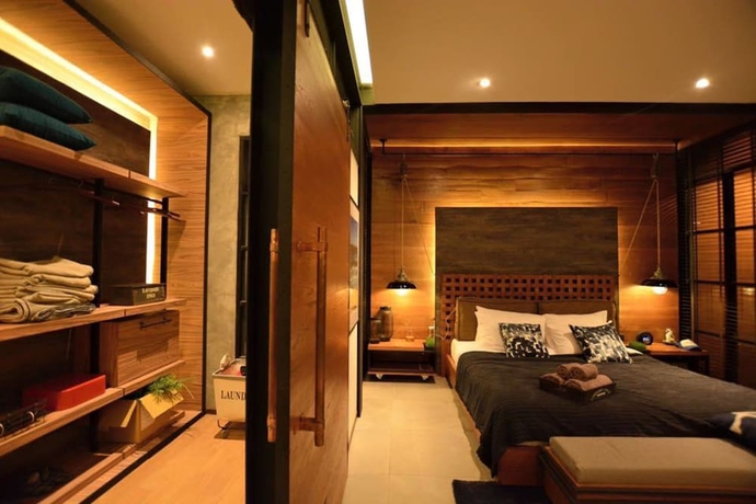 Imagen de la habitación del Hotel The Cabin Beach Resort. Foto 14