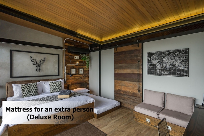 Imagen de la habitación del Hotel The Cabin Beach Resort. Foto 17