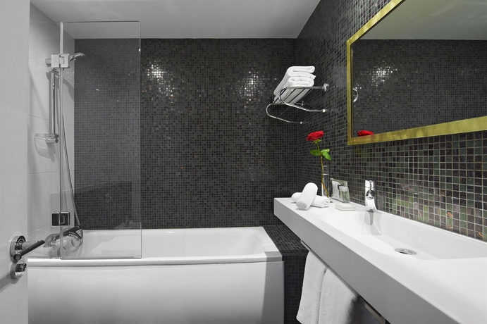 Imagen de la habitación del Hotel The Caesar. Foto 5