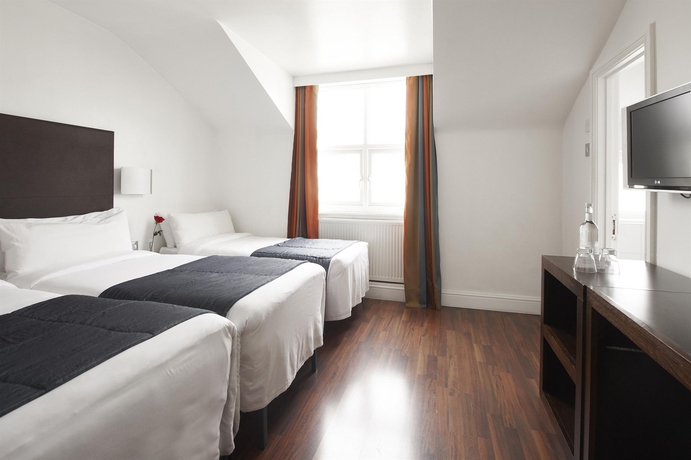 Imagen de la habitación del Hotel The Caesar. Foto 6