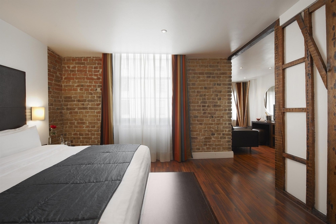 Imagen de la habitación del Hotel The Caesar. Foto 10