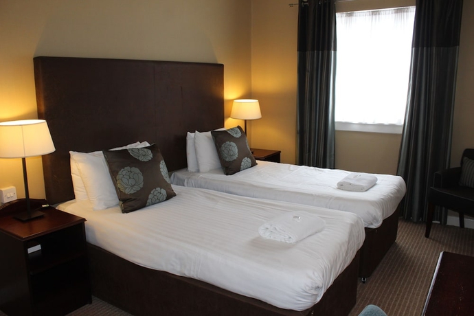 Imagen de la habitación del Hotel The Cairn, Bathgate. Foto 11