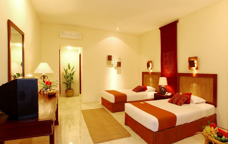 Imagen de la habitación del Hotel The Cakra. Foto 5
