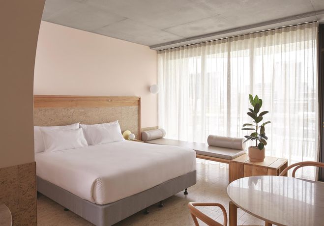 Imagen de la habitación del Hotel The Calile Hotel. Foto 10