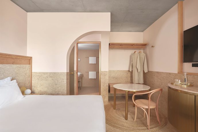 Imagen de la habitación del Hotel The Calile Hotel. Foto 11