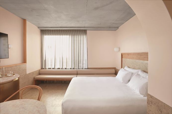 Imagen de la habitación del Hotel The Calile Hotel. Foto 16