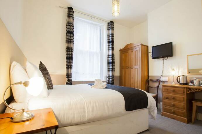 Imagen de la habitación del Hotel The Camberley. Foto 20
