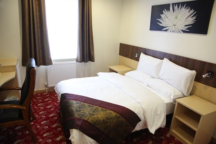 Imagen de la habitación del Hotel The Cambridge. Foto 9