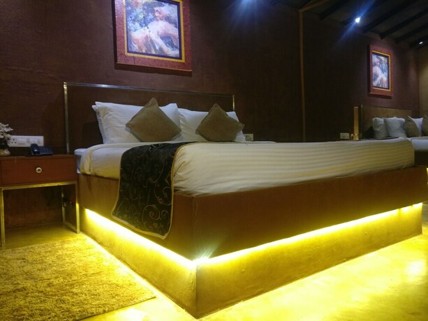 Imagen de la habitación del Hotel The Camelot Beach Resort. Foto 17