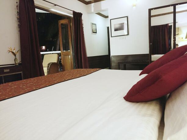 Imagen de la habitación del Hotel The Camelot Beach Resort. Foto 22