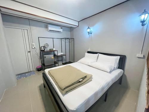 Imagen de la habitación del Hotel The Camp Chiangkhan. Foto 13