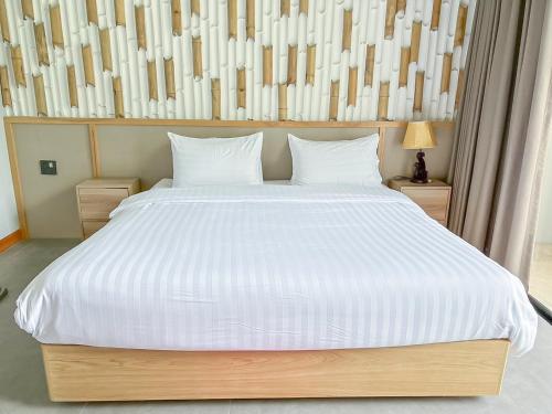 Imagen de la habitación del Hotel The Camp Chiangkhan. Foto 18