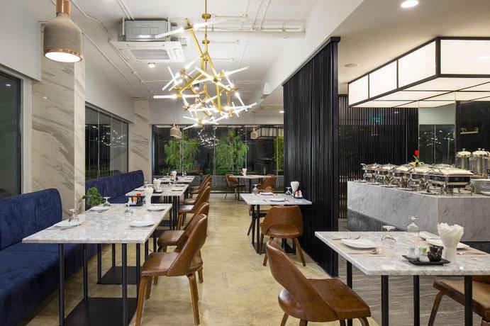 Imagen del bar/restaurante del Hotel The Canal 304. Foto 6