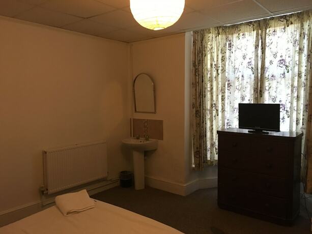 Imagen de la habitación del Hotel The Canberra Guest House. Foto 15