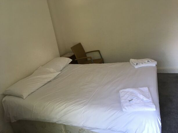Imagen de la habitación del Hotel The Canberra Guest House. Foto 16