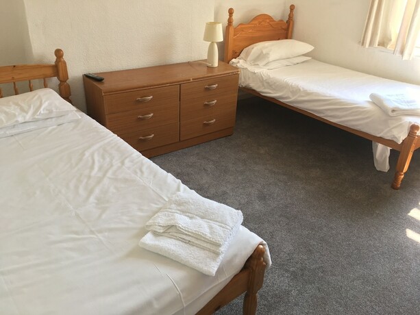 Imagen de la habitación del Hotel The Canberra Guest House. Foto 19