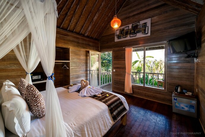 Imagen de la habitación del Hotel The Canda Villas. Foto 18