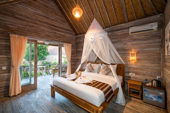 Imagen de la habitación del Hotel The Canda Villas. Foto 22