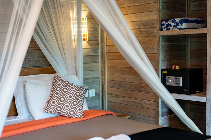 Imagen de la habitación del Hotel The Canda Villas. Foto 24