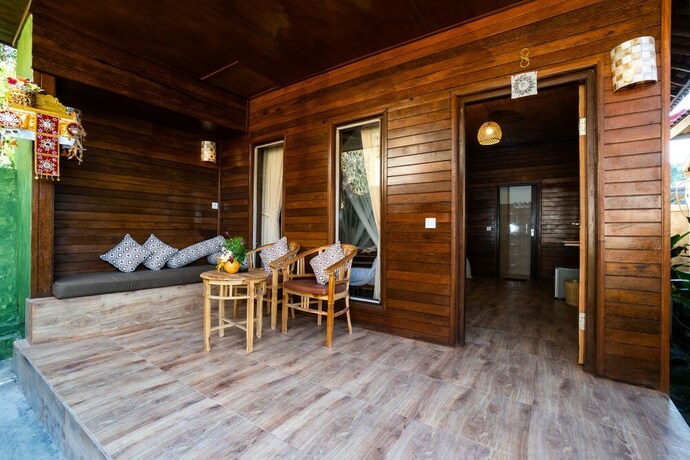 Imagen de la habitación del Hotel The Canda Villas. Foto 25