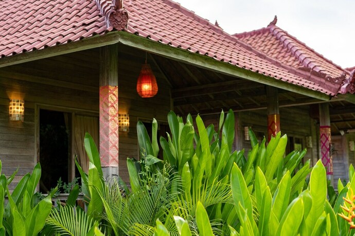 Imagen de la habitación del Hotel The Canda Villas. Foto 26