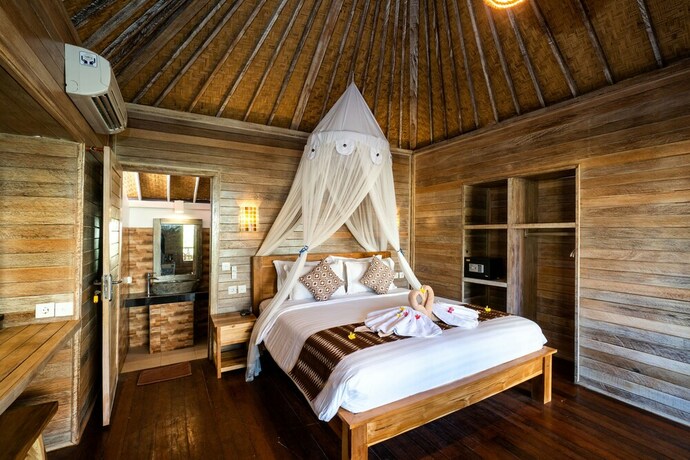 Imagen de la habitación del Hotel The Canda Villas. Foto 27