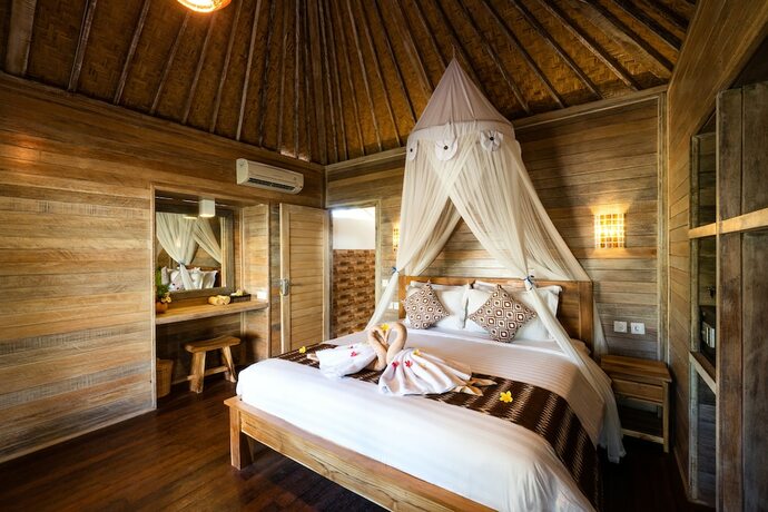 Imagen de la habitación del Hotel The Canda Villas. Foto 31