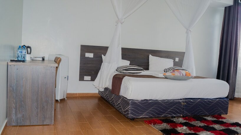 Imagen de la habitación del Hotel The Candela. Foto 13