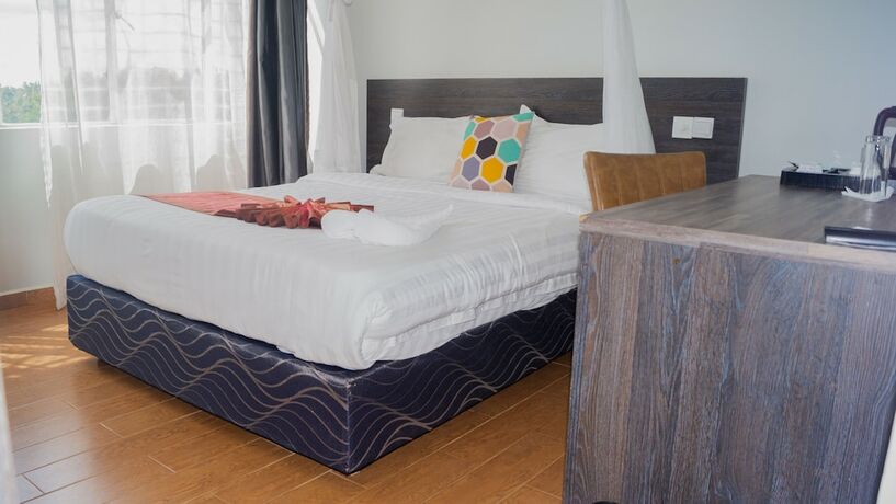 Imagen de la habitación del Hotel The Candela. Foto 17