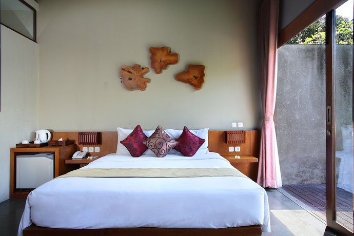 Imagen de la habitación del Hotel The Canggu Boutique Villas and Spa. Foto 4