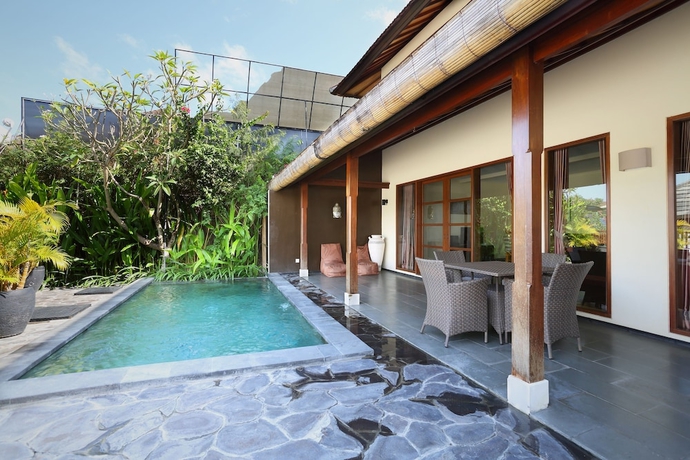 Imagen de la piscina del Hotel The Canggu Boutique Villas and Spa. Foto 16