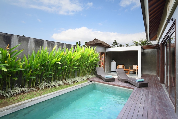 Imagen de la piscina del Hotel The Canggu Boutique Villas and Spa. Foto 19