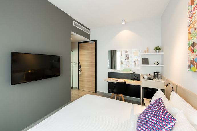 Imagen de la habitación del Hotel The Canvas. Foto 11