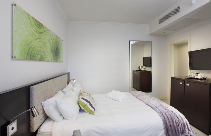 Imagen de la habitación del Hotel The Capital 20 West. Foto 4