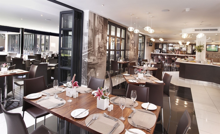 Imagen del bar/restaurante del Hotel The Capital 20 West. Foto 2