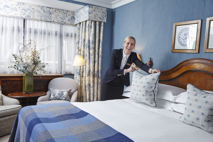 Imagen de la habitación del Hotel The Capital , Apartments and Townhouse. Foto 9