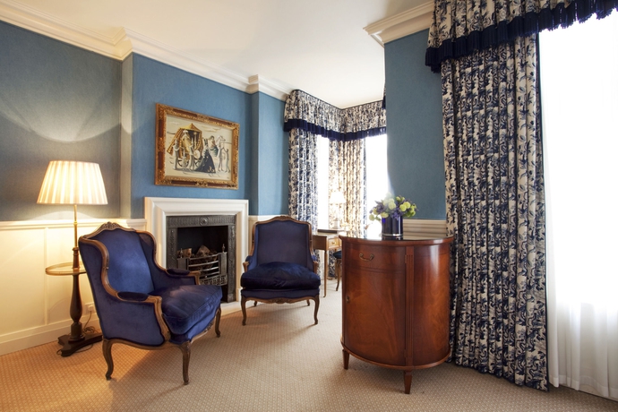 Imagen de la habitación del Hotel The Capital , Apartments and Townhouse. Foto 11