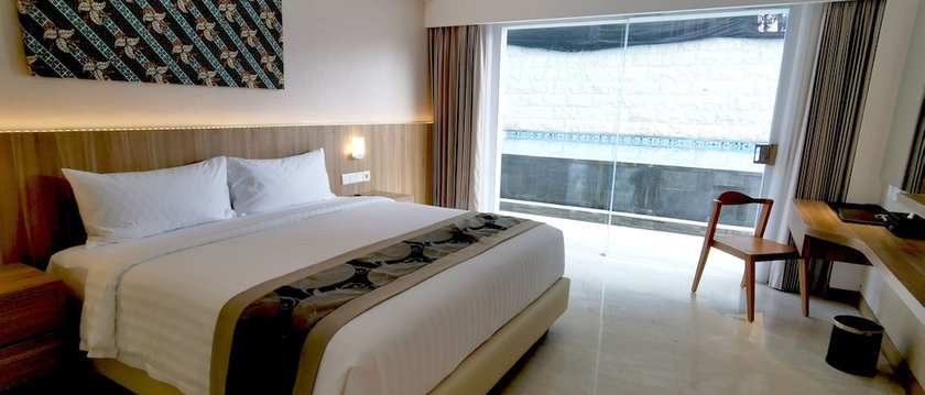 Imagen de la habitación del Hotel The Capital Hotel and Resort Seminyak. Foto 7