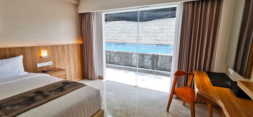 Imagen de la habitación del Hotel The Capital Hotel and Resort Seminyak. Foto 13